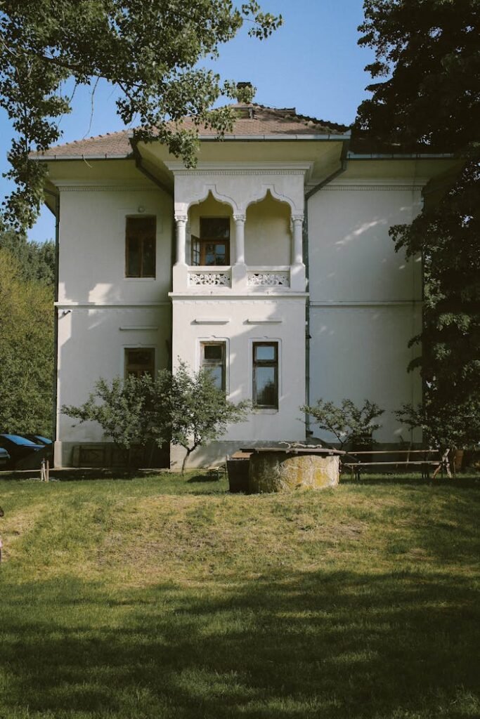 Beautiful white residence with classic design surrounded by nature.